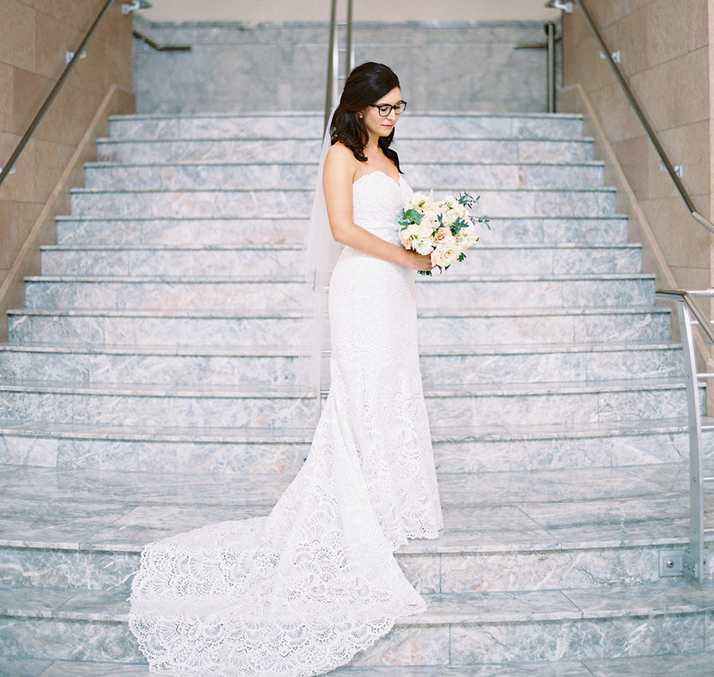 Bride standing on stairs